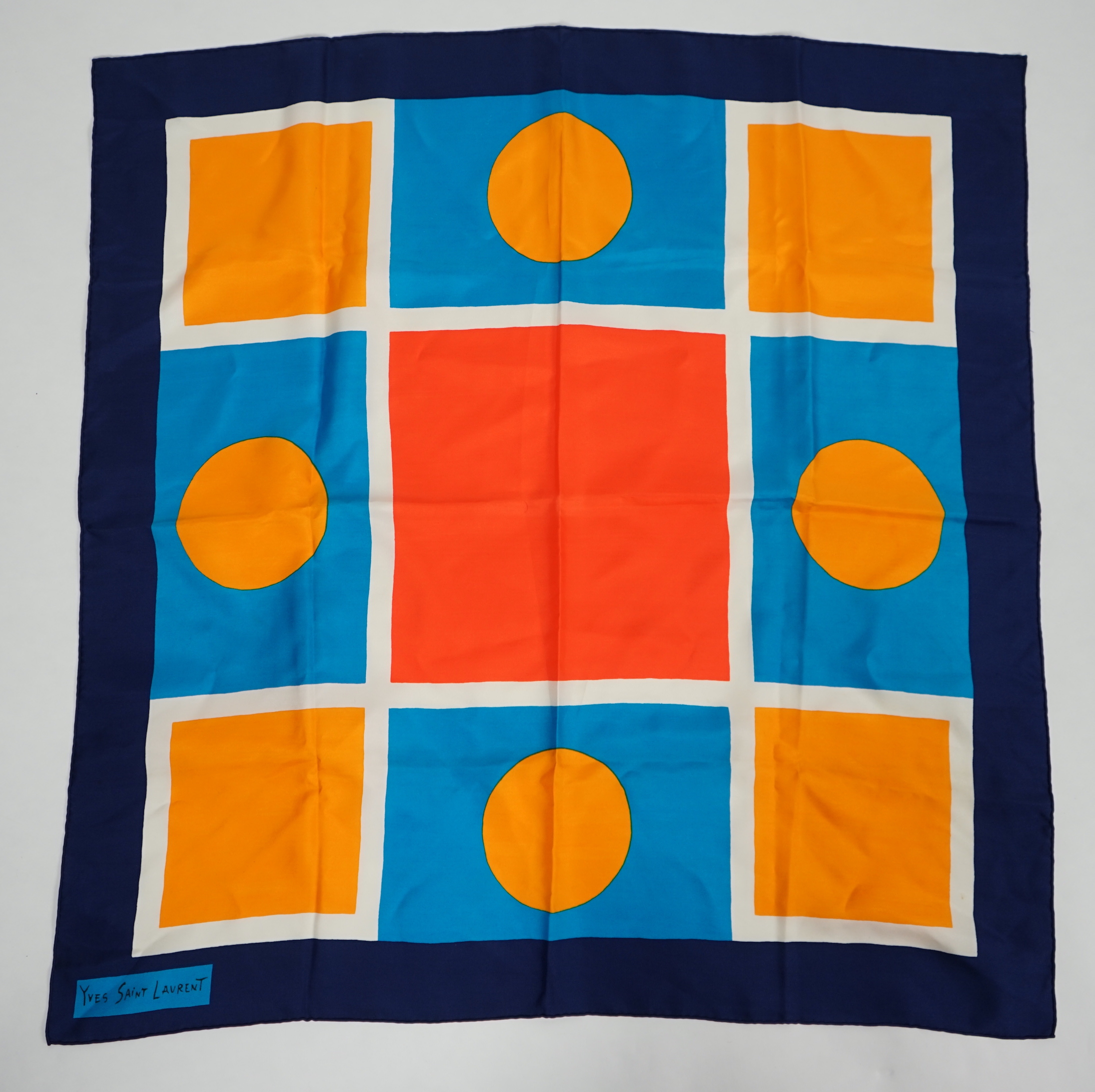 A selection of Yves Saint Laurent, two Christian Dior, Richel and Loewe silk scarves, YSL, 83cm x 85cm Christian Dior: 84cm x 80cm Richel: 87cm x 87cm Loewe: 86cm x 82cm Christian Dior large scarf 120cm x 130cm approx.